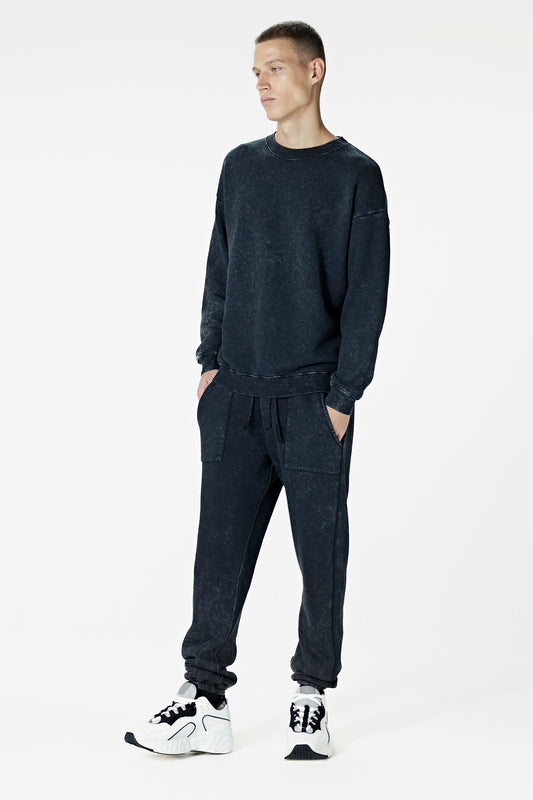 Male Model wearing black washed sweatshirt - BODA SKINS. front facing